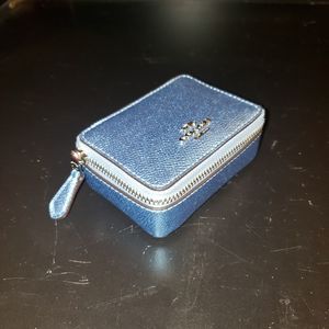 Metallic blue coach pill box